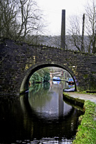 [ photo: Arched Bridge, Canal Boats, and Mill Chimney Reflected in Rochdale Canal, Hebden Bridge, Calder Valley, W Yorkshire Dec 2005 (img 102-097) ]
