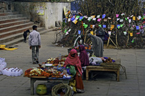 [ photo: Puja Flower Sellers at Assi Ghat Varanasi, Uttar Pradesh, India, February 2010 (img 194-089) ]