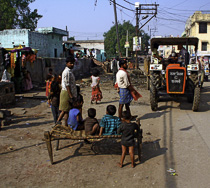 [ photo: Kashi Streets, KIds and Tractor, Varanasi, Uttar Pradesh, India, February 2010 (img 197-052) ]